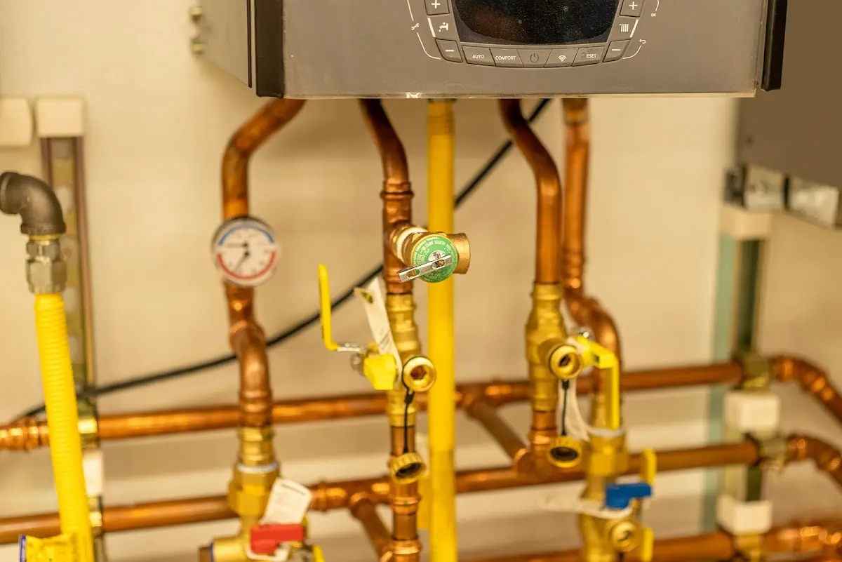 Licensed technician providing Backflow Prevention for a homeowner in Amherst